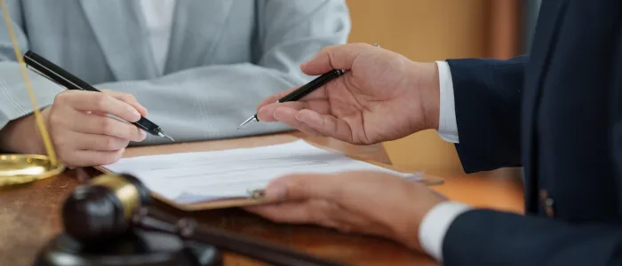 Lawyers discussing a document