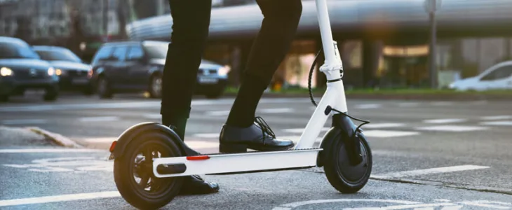 Man riding e-scooter in the city
