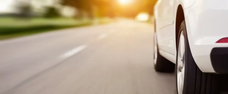 Car driving down the road